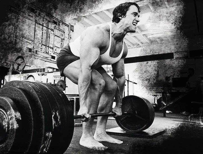 Arnold doing exercises to improve deadlift