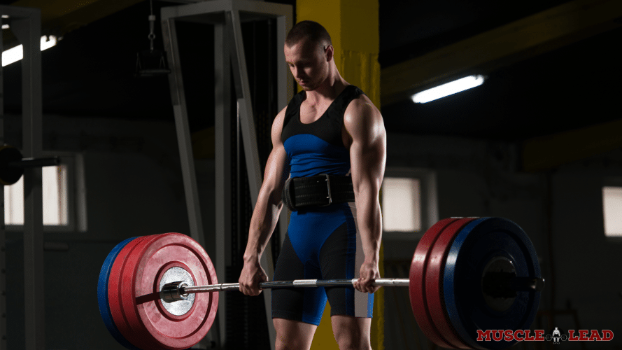 Breathing out at the top of the movement during deadlift